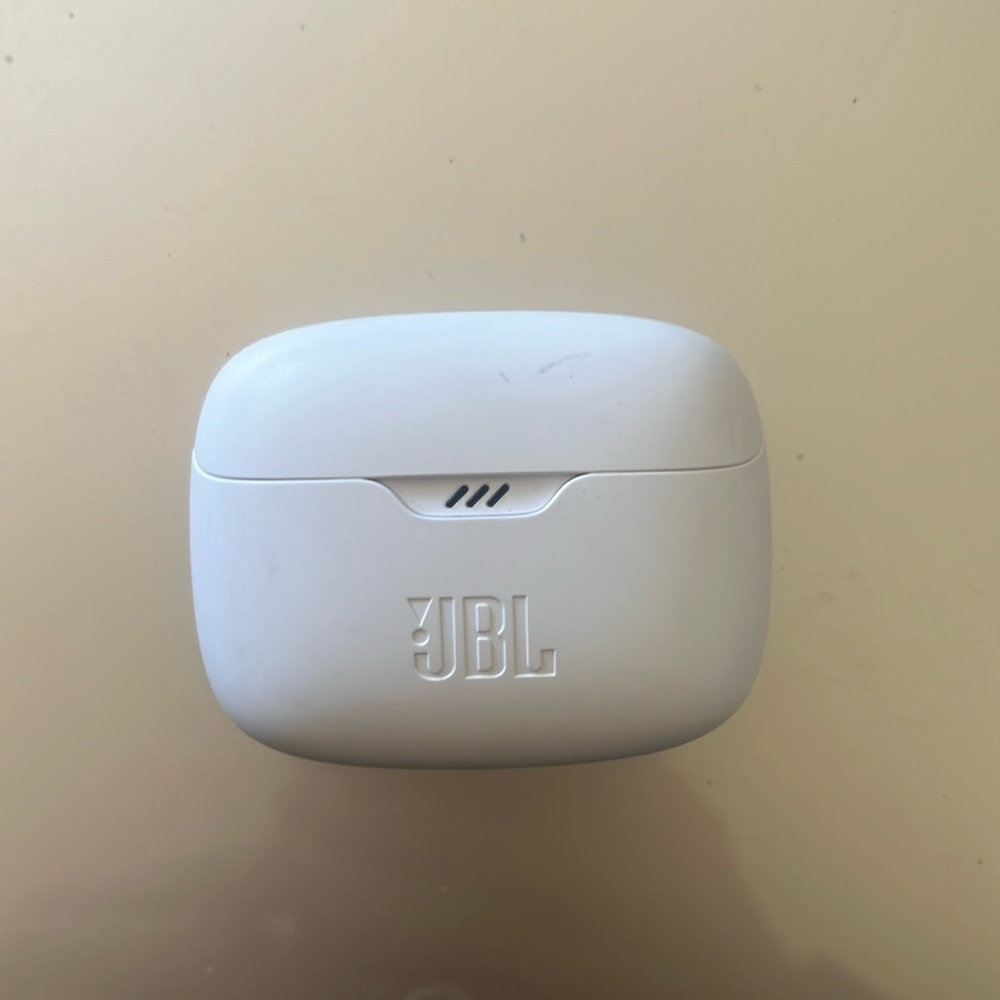JBL Wireless Earbuds with charging cable.